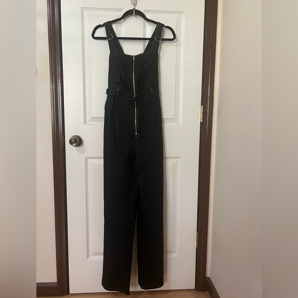 Tiger Mist curve-hugging jumpsuit.